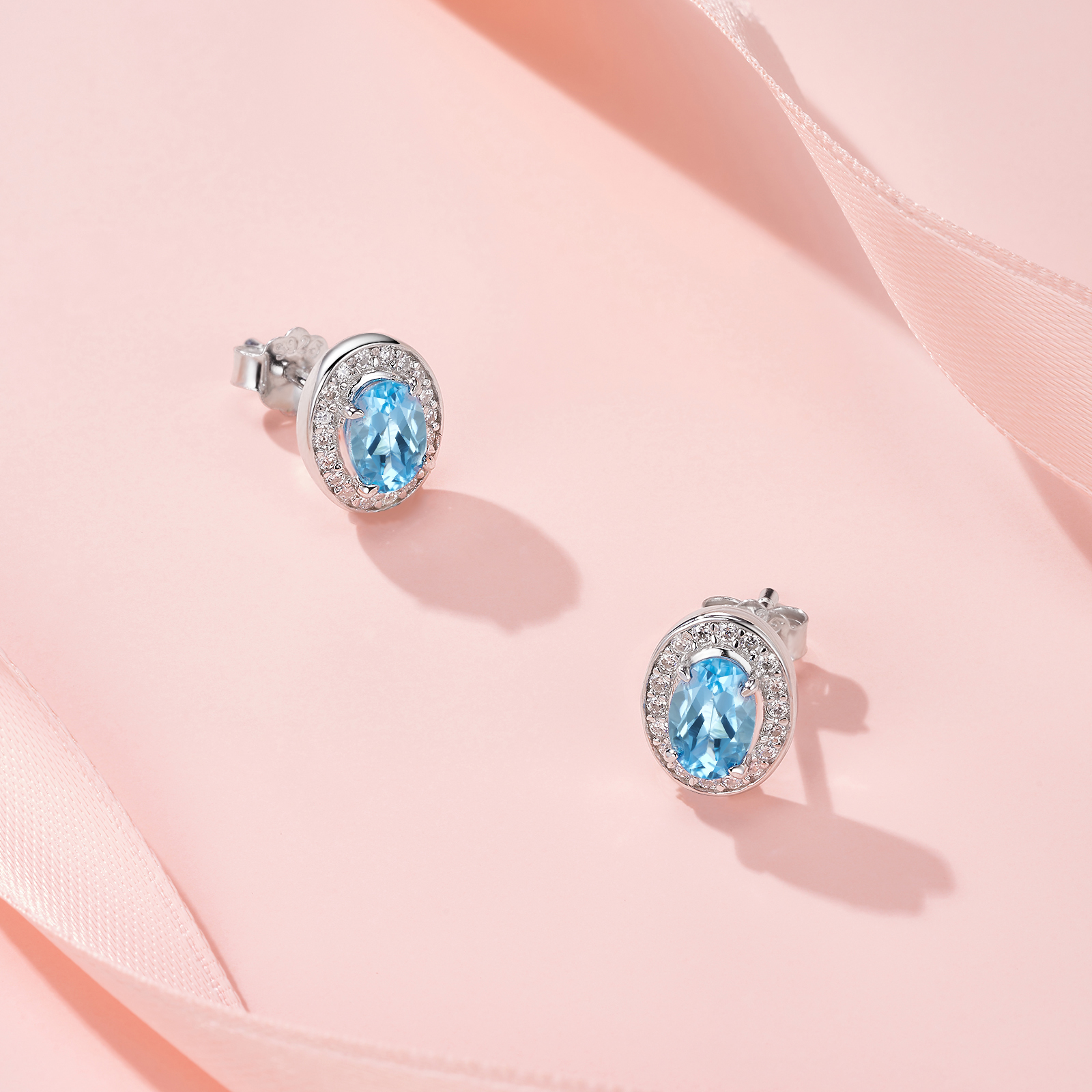 1.65g Sterling Silver Halo Stud Earrings Oval Cut Blue Topaz & Moissanite, Platinum Plated