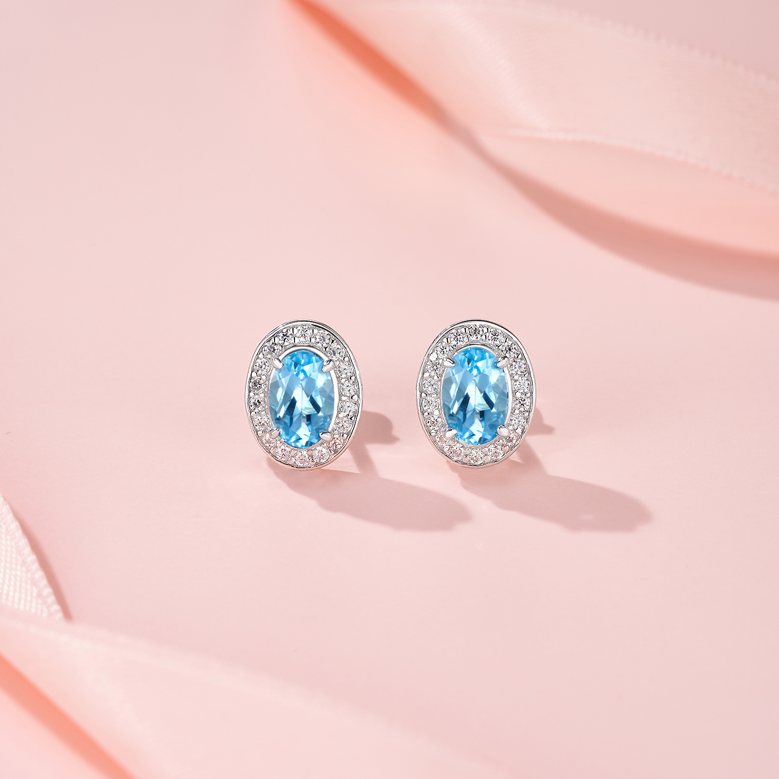 1.65g Sterling Silver Halo Stud Earrings Oval Cut Blue Topaz & Moissanite, Platinum Plated