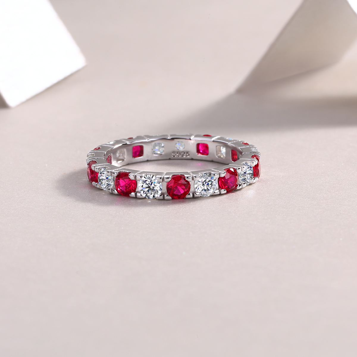 2.4g Sterling Silver Platinum Plated Eternity Ring Synthetic Ruby & White Stone