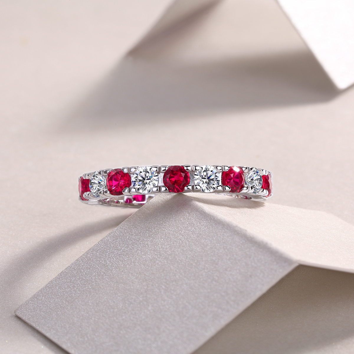 2.4g Sterling Silver Platinum Plated Eternity Ring Synthetic Ruby & White Stone