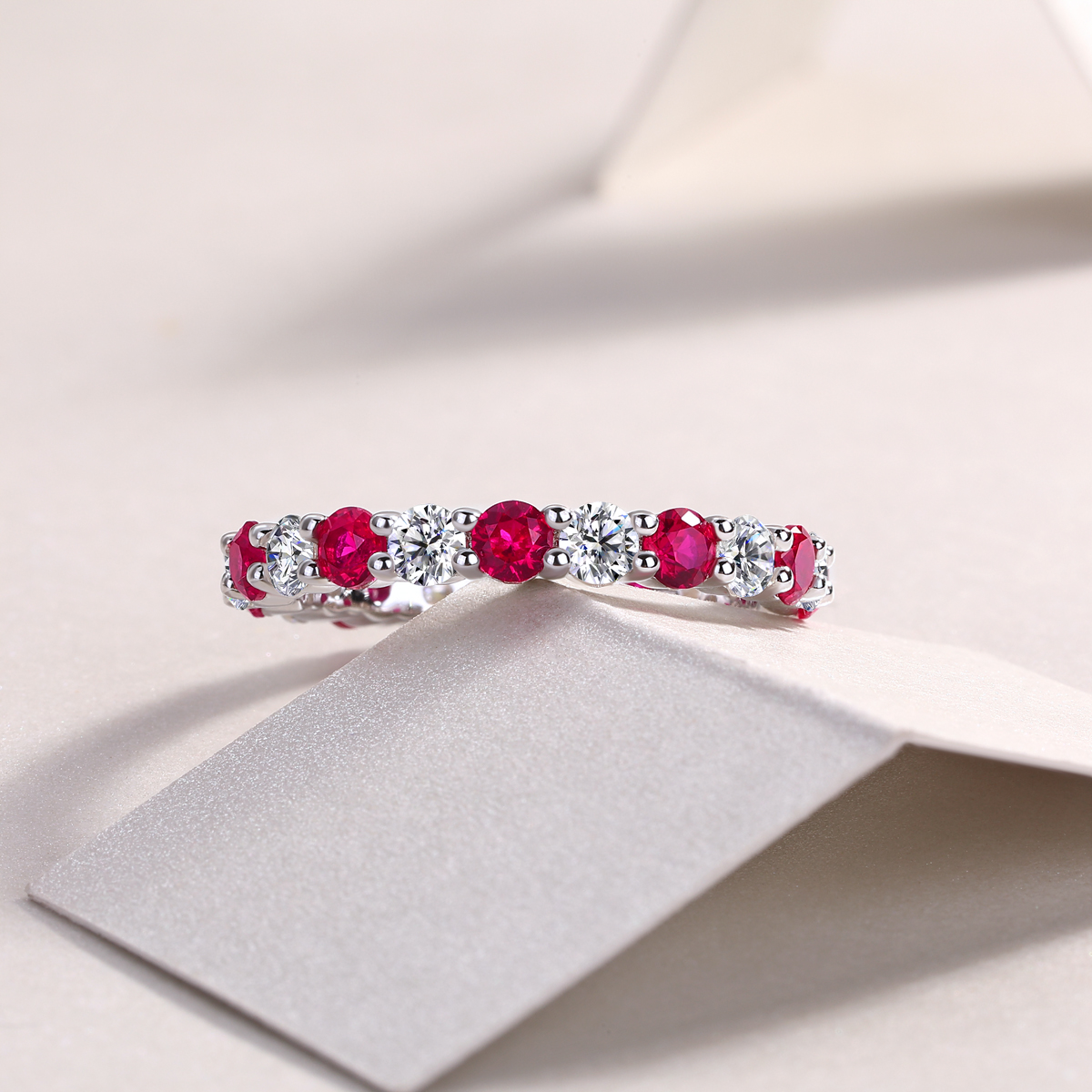 2.4g Sterling Silver Platinum Plated Ring Synthetic Ruby & White Stone Alternating