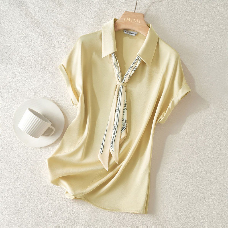 A Stylish Minimalist V-neck Short-sleeve Piece Thats Easy To Style With Anything