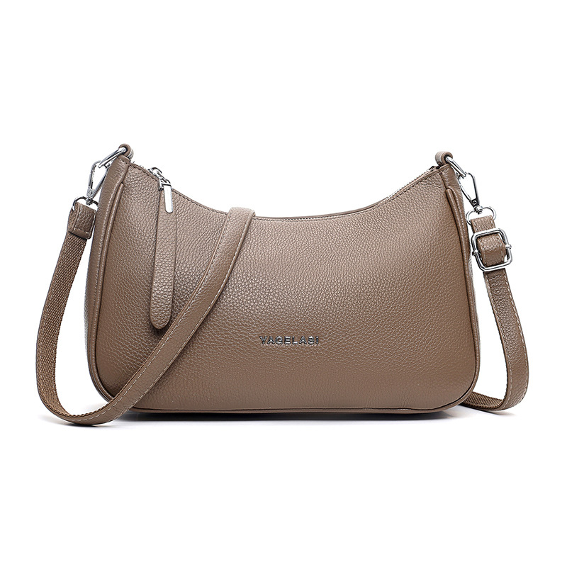 An Elegant And Minimalist Crossbody Bag With A Classic Design Crafted From Soft Leather