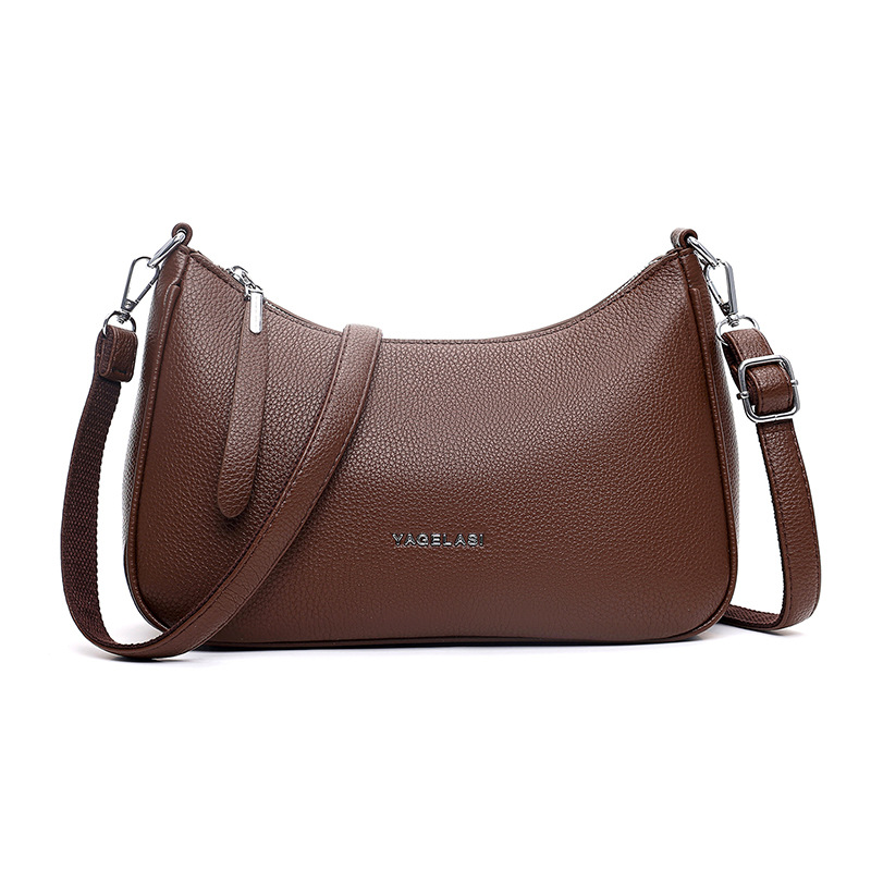 An Elegant And Minimalist Crossbody Bag With A Classic Design Crafted From Soft Leather