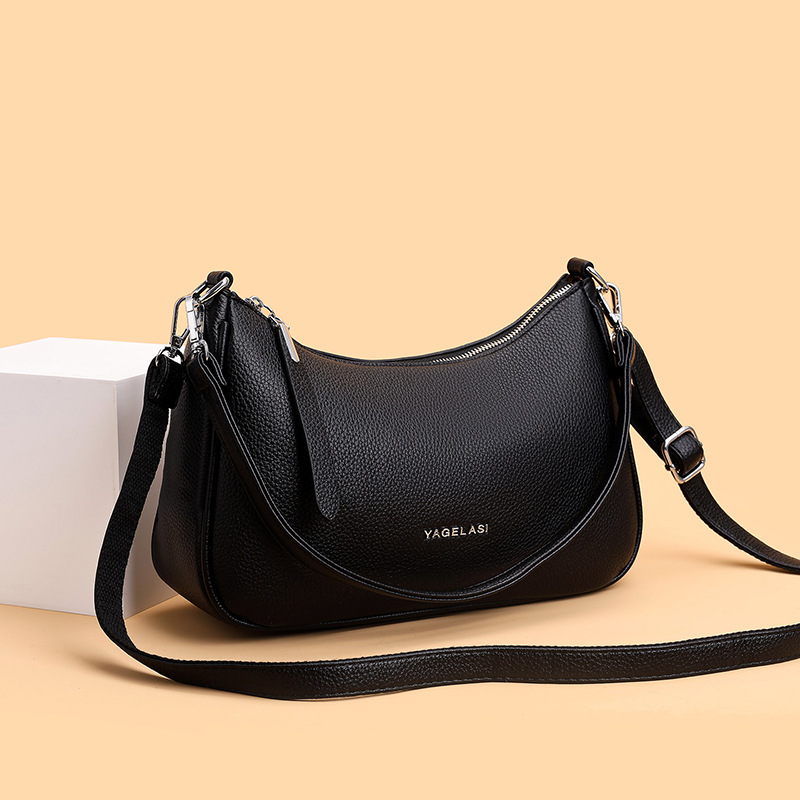 An Elegant And Minimalist Crossbody Bag With A Classic Design Crafted From Soft Leather