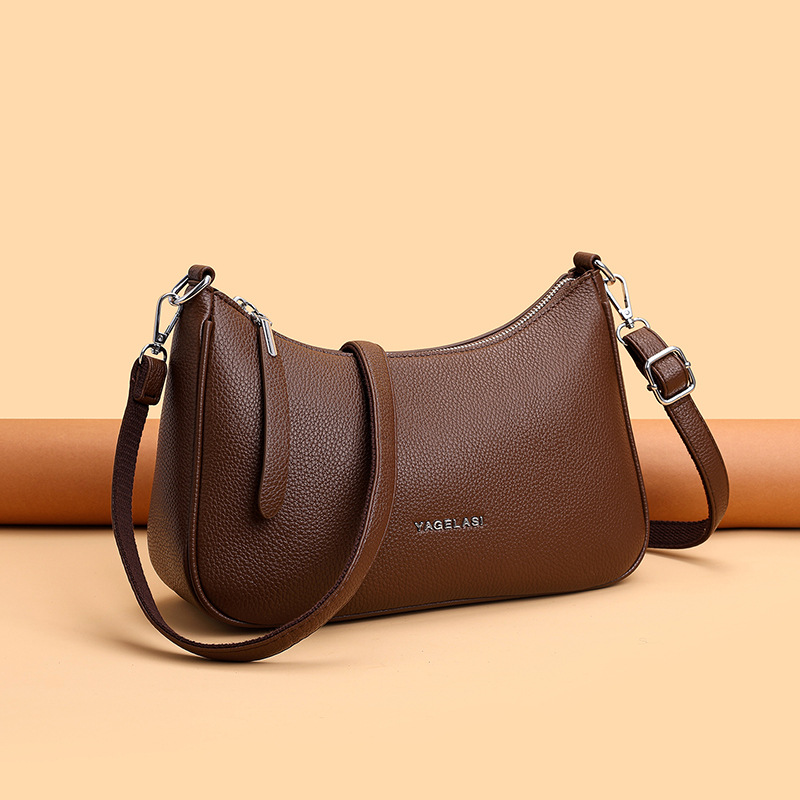An Elegant And Minimalist Crossbody Bag With A Classic Design Crafted From Soft Leather