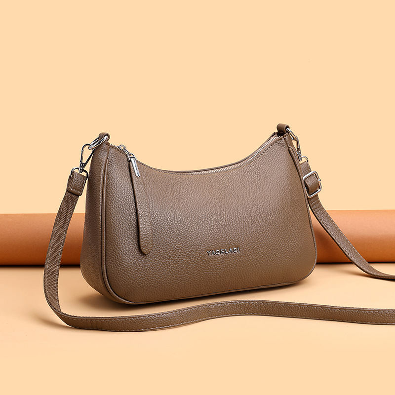 An Elegant And Minimalist Crossbody Bag With A Classic Design Crafted From Soft Leather