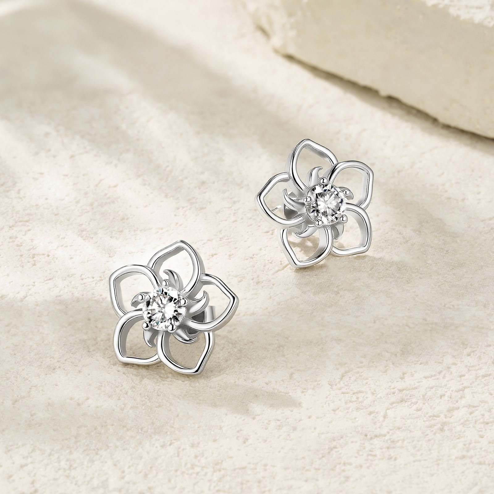 Sterling Silver Abstract Flower Stud Earrings, 0.5ct D-VVS1 Moissanite, Platinum Plated